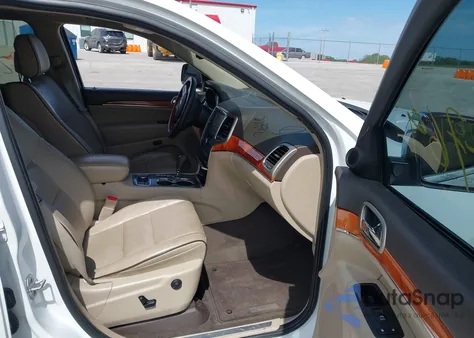 2013 Jeep Grand Cherokee Overland z USA, uszkodzony, nr VIN 1C4RJFCG4DC643939